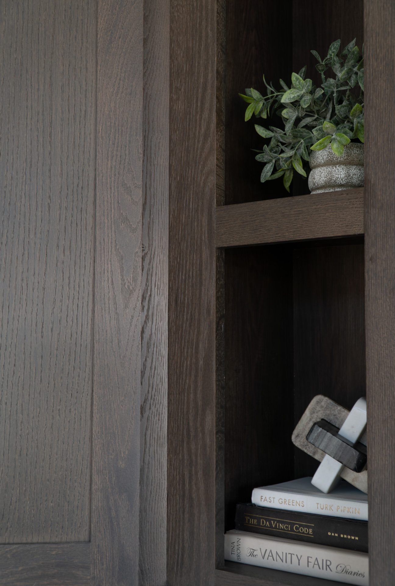 Built-in shelving with books and decor