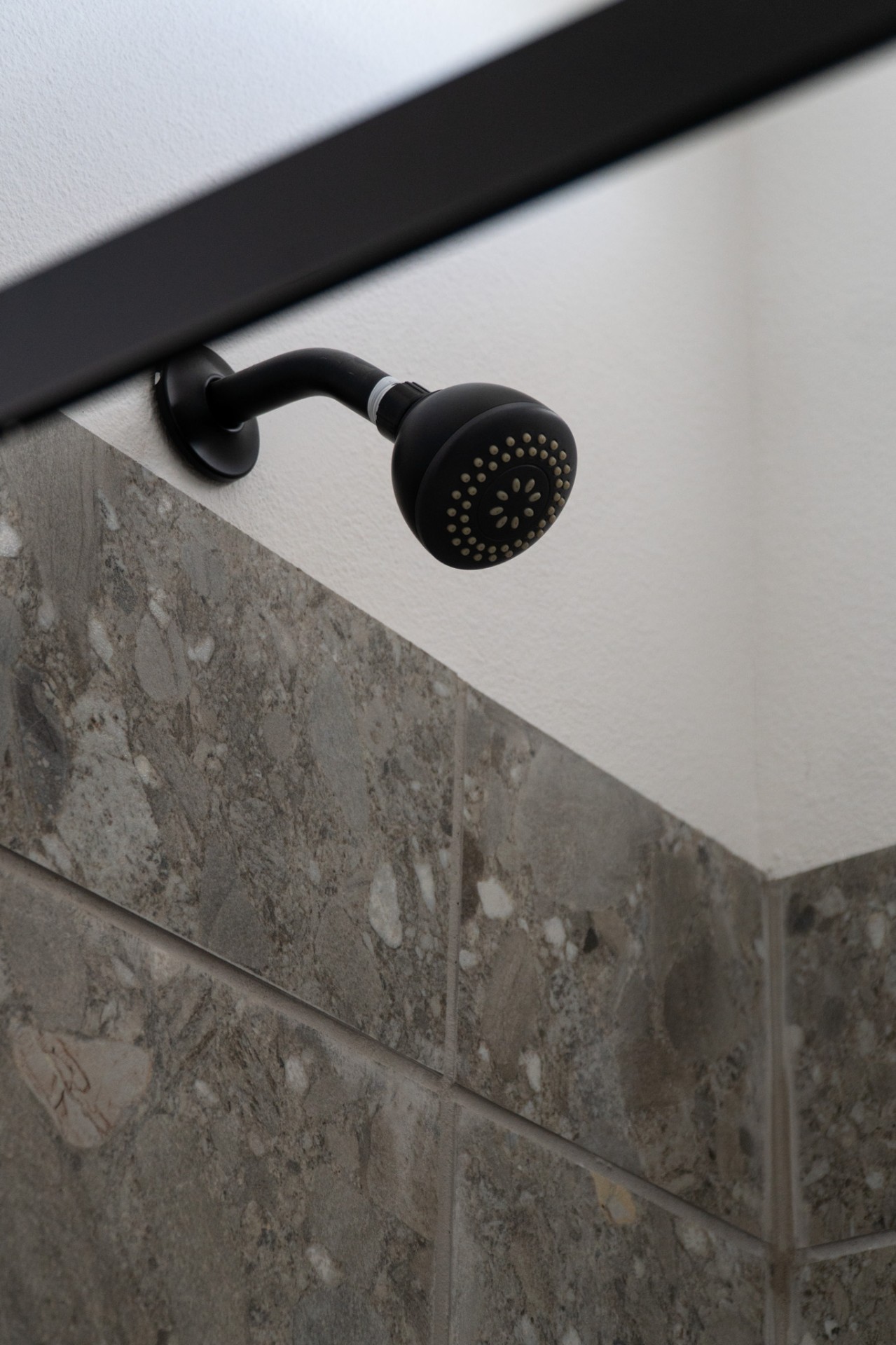 Shower head with stone tile