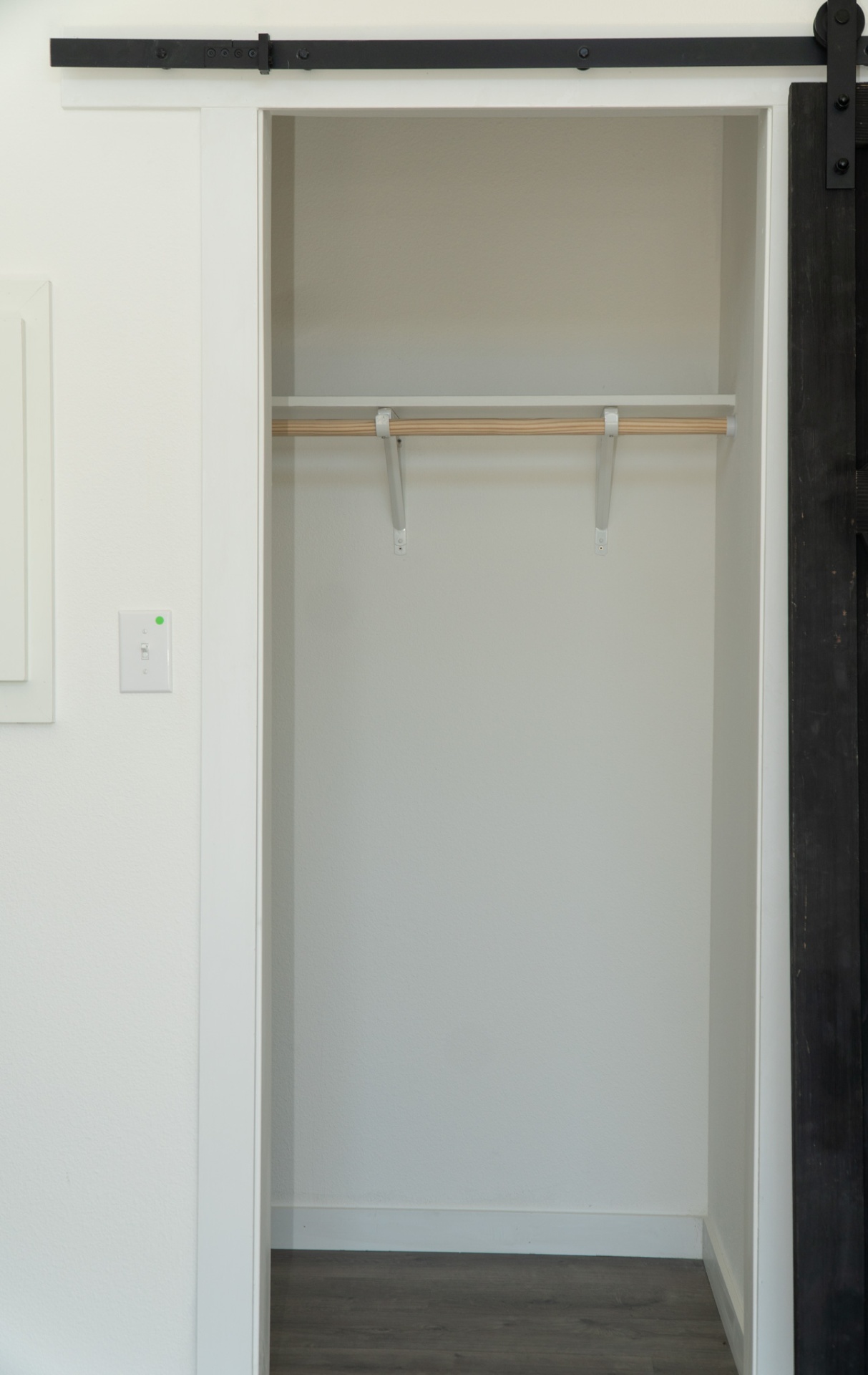 Closet with barn door hardware